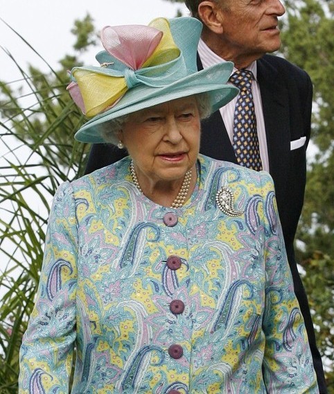  Queen Elizabeth II of Great Britain, wearing a dress with paisley motifs.