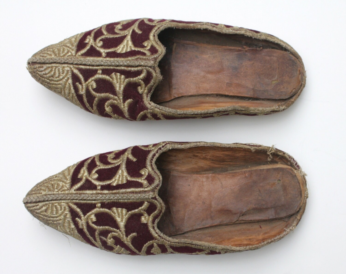 Pair of red velvet slippers, Morocco, early 21st century.