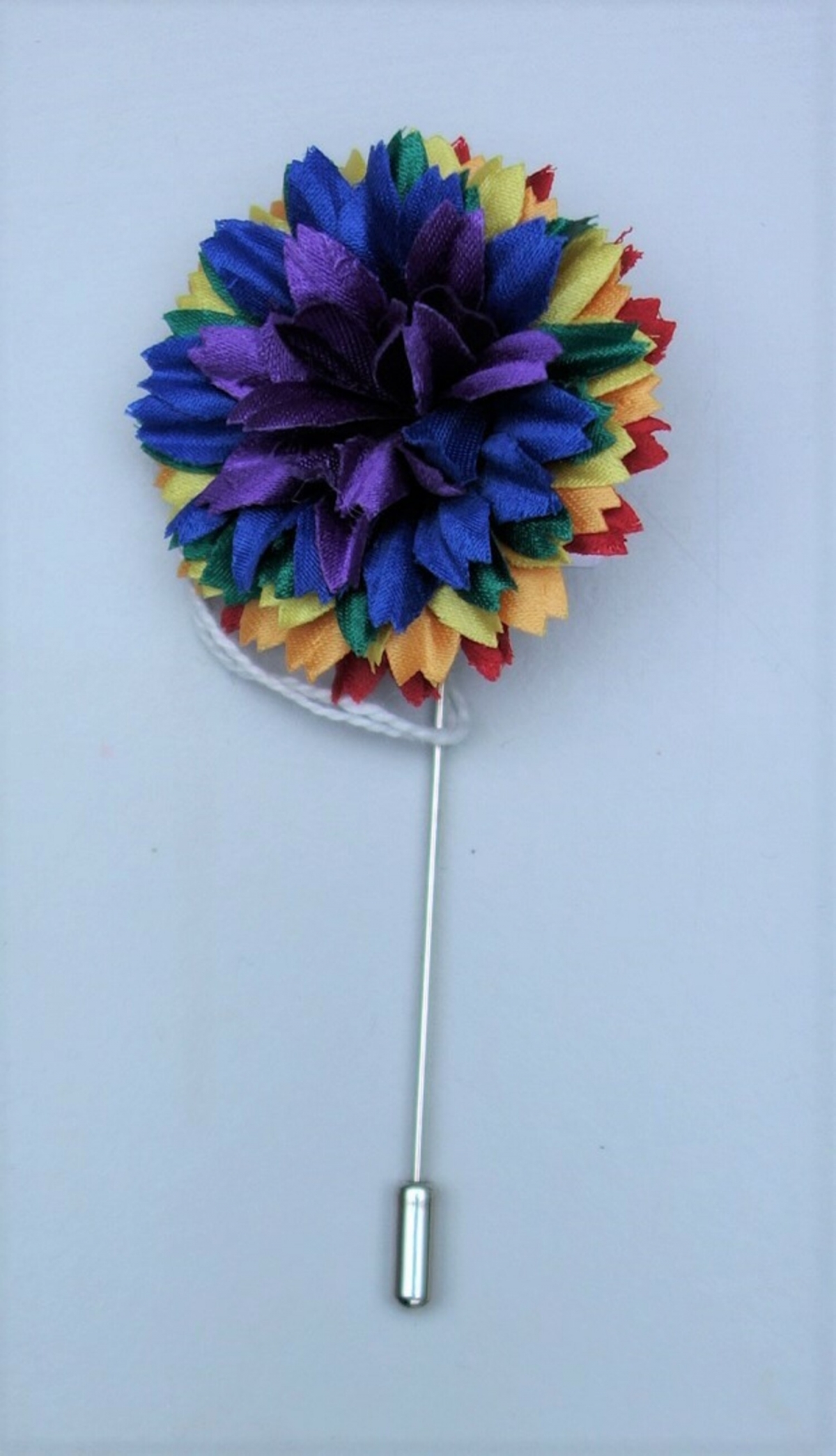 A commemorative pin celebrating the 50th anniversary of the Stonewall uprising, hand made by M&amp;S Schmalberg, New York.