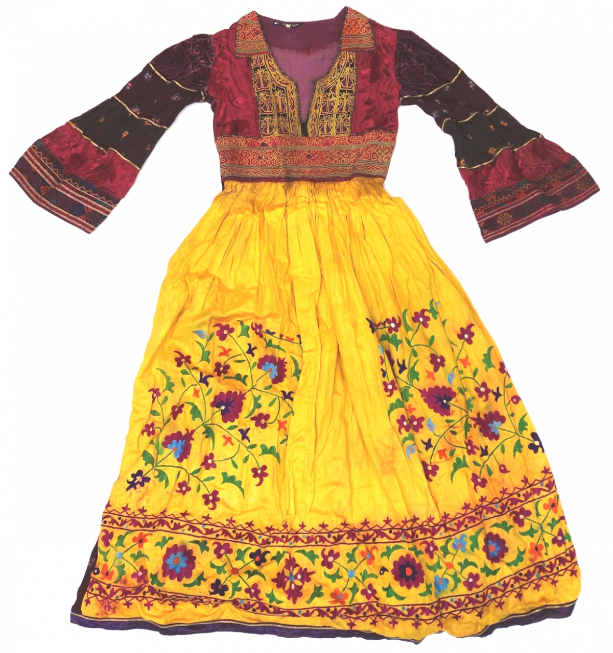 Dress made from an Hazara dress bodice from Afghanistan and a skirt made from an Uzbek suzani (needlework), sold in the 1970s under a Dutch designer's label.