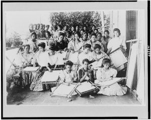 Embroidery class in Manila, early 20th century