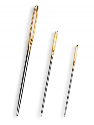 Three examples of a darning needle.