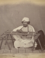Photograph of an embroiderer in Delhi, c. 1863.