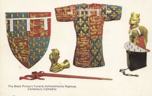 Replicas, made in the 1950's, of the armorial achievements of the Black Prince, including his jupon.