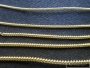 Examples of pearl purl gold work.