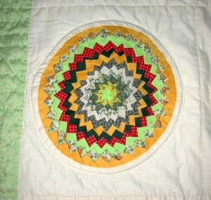 Pine burr quilt, by Loretta Bennett.