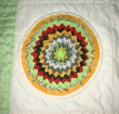 Pine burr quilt, by Loretta Bennett.