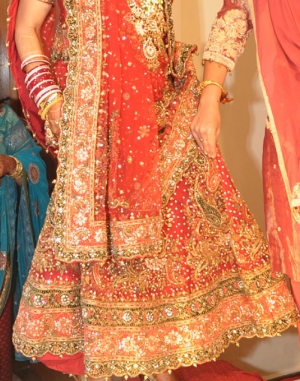 Bridal gagra dress with gotapatti decoration.
