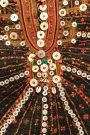 Tutintfukt buttons on a Siwa oasis bridal dress.