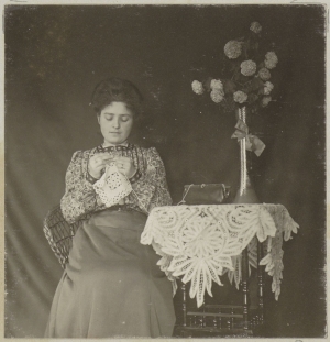 Photograph of woman doing crochet. The Netherlands (?), c. 1900-1910.