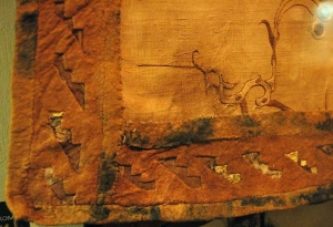 Saddle cloth with Chinese silk in the centre, Barrow 5, Pazyryk, 4th-3rd centuries BC.