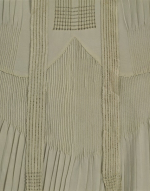 Detail of a French, silk crêpe day dress, with pin tucks, c. 1928.
