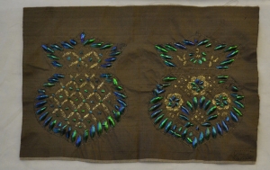 Length of silk cloth decorated with gold wire and beetlewings (19th century, India).