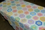 Example of a quilt with the Grandmother&#039;s flower garden pattern.