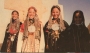 Siwa girls in their family&#039;s bridal outfits, late 20th century.