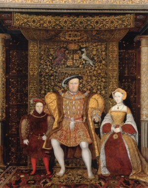 Henry VIII sitting under and in front of a Cloth of State