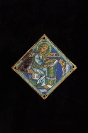 Twelfth century copper-gilt plague from France, showing St Luke.