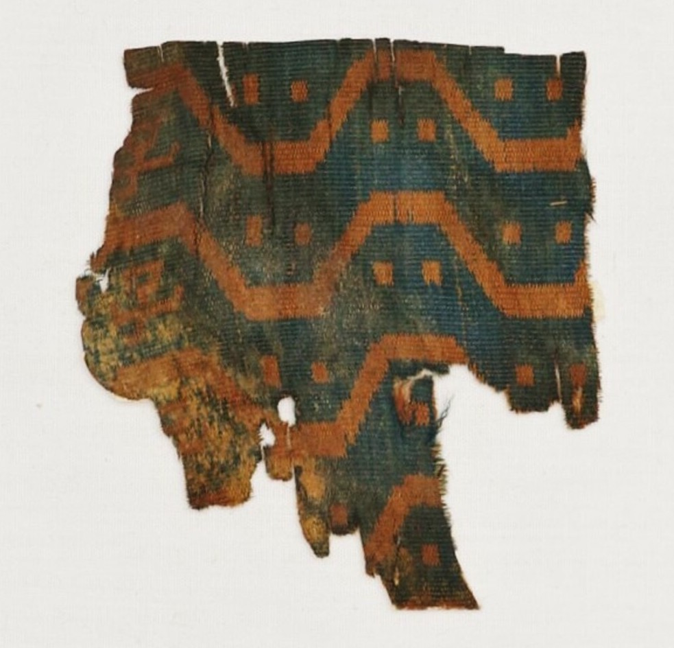 Small fragment of Jin silk from Niya, Xinjiang, western China, ca. 100 AD (TRC 2000.0009).