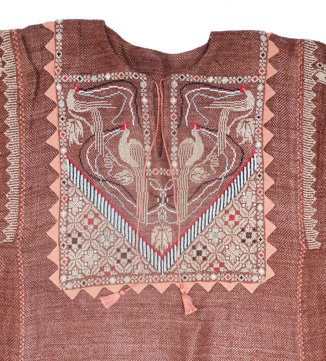 Fig. 3. Front of an embroidered Palestinian dress, late 20th century, made by ANAT, Syria (TRC 2003.0004).