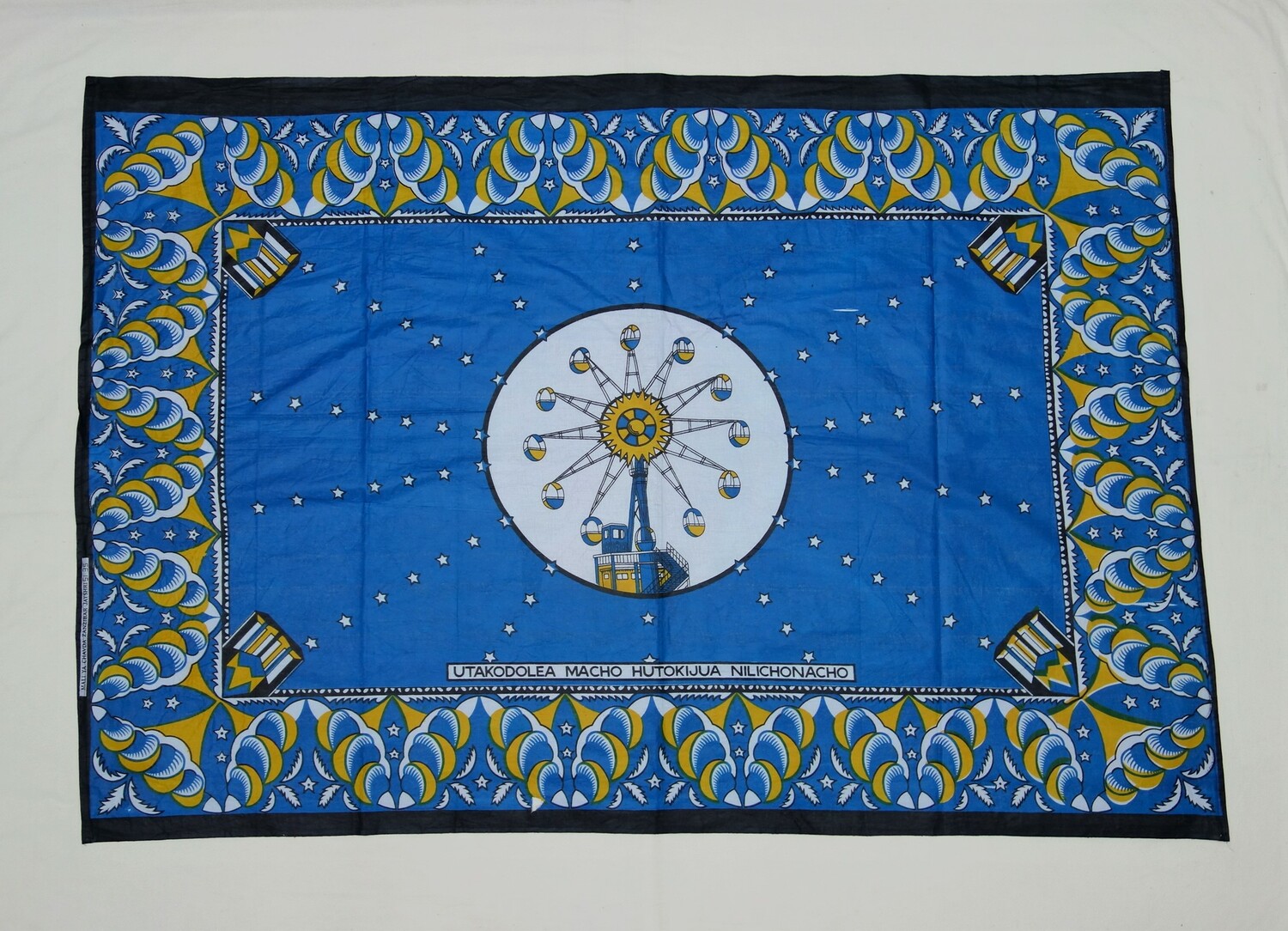 Kanga from Kenya, 2004 (TRC 2004.0156). The Swahili text reads: UTAKODOLEA MACHO HUTOKIJUA NILICHONACHO , which translates roughly as; "You can stare at me, but you don't know what I have got." This and other kangas will be displayed at a pop-up exhibition at the TRC later this year.