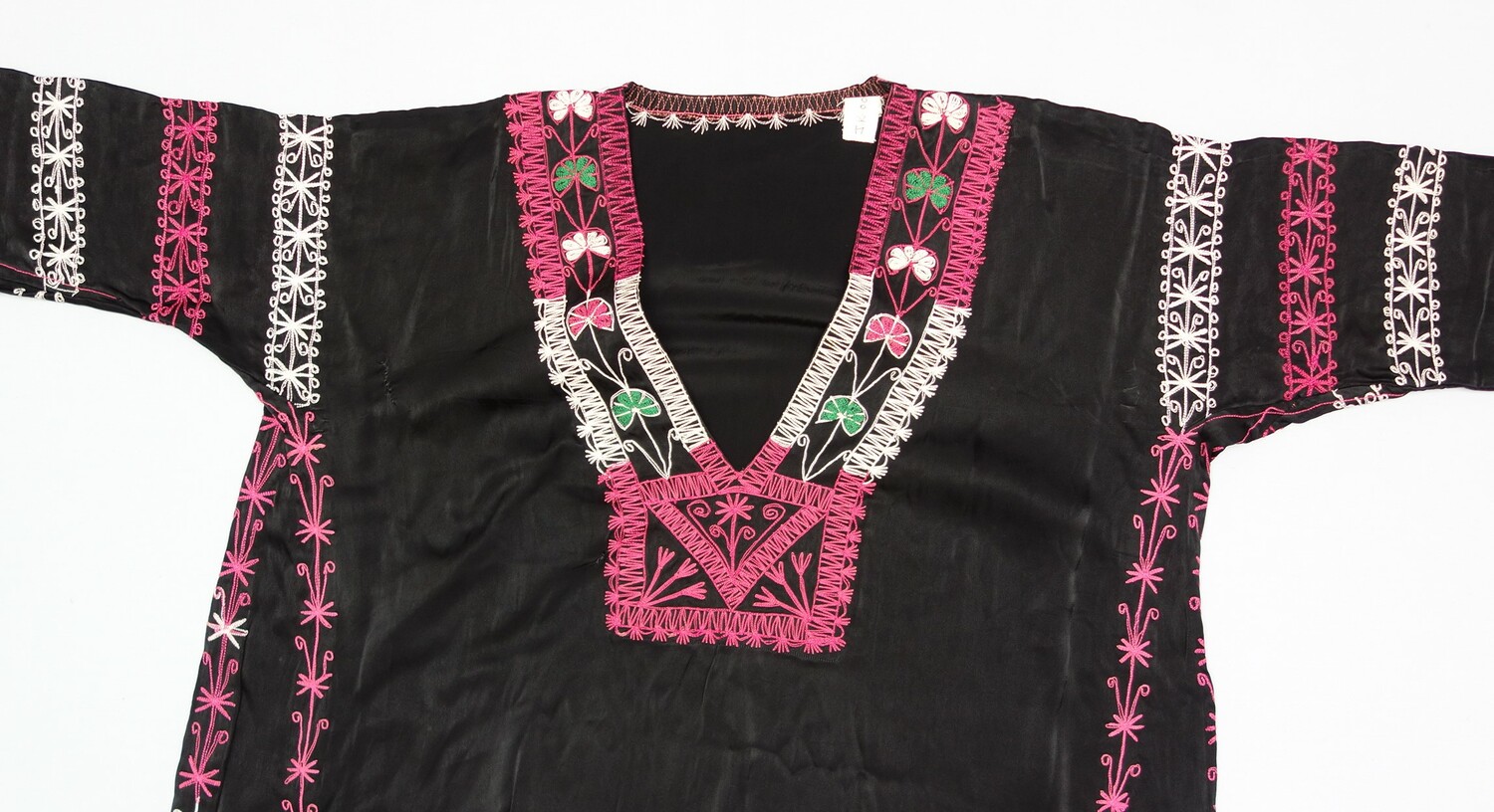 Detail of an embroidered dress from northern Jordan (TRC 2005.0078).