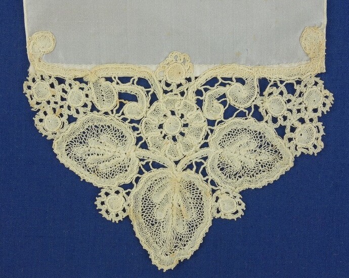 Detail of a silk sash with Duchesse (bobbin) lace at the ends, Belgium (TRC 2007.0845).