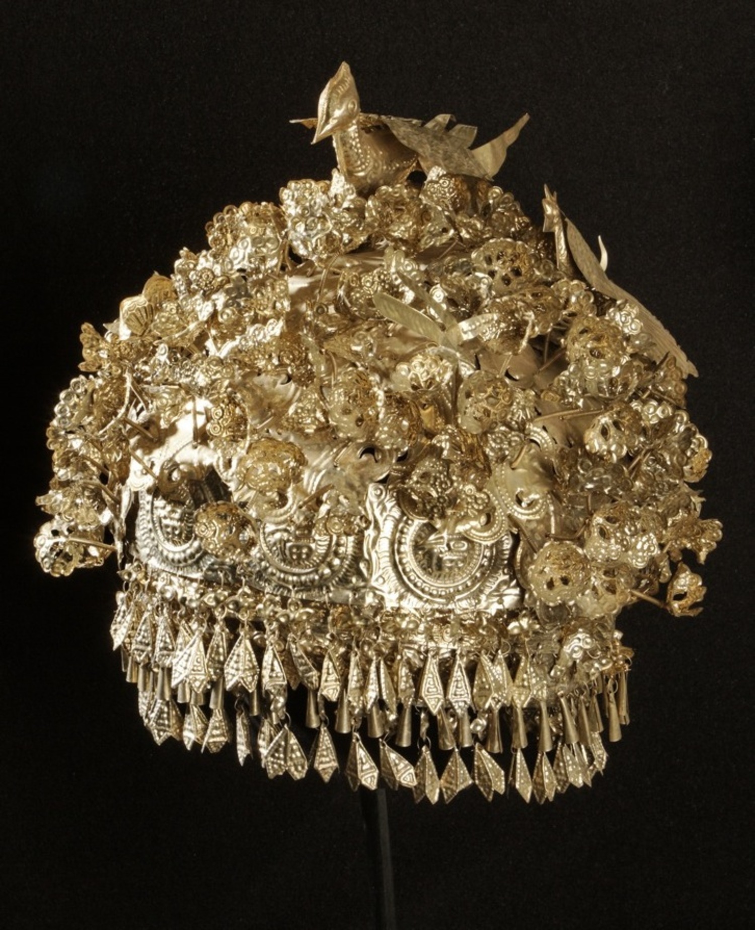 Fig. 5. Ceremonial headwear, aluminium and wire. Miao, China, mid-20th century (TRC 2011.0344).
