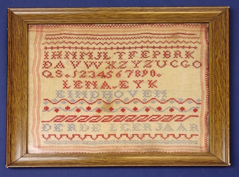 School embroidery sampler, with increasing difficulty, first square letters, then round ones, worked in 1927 (TRC 2013.0286).