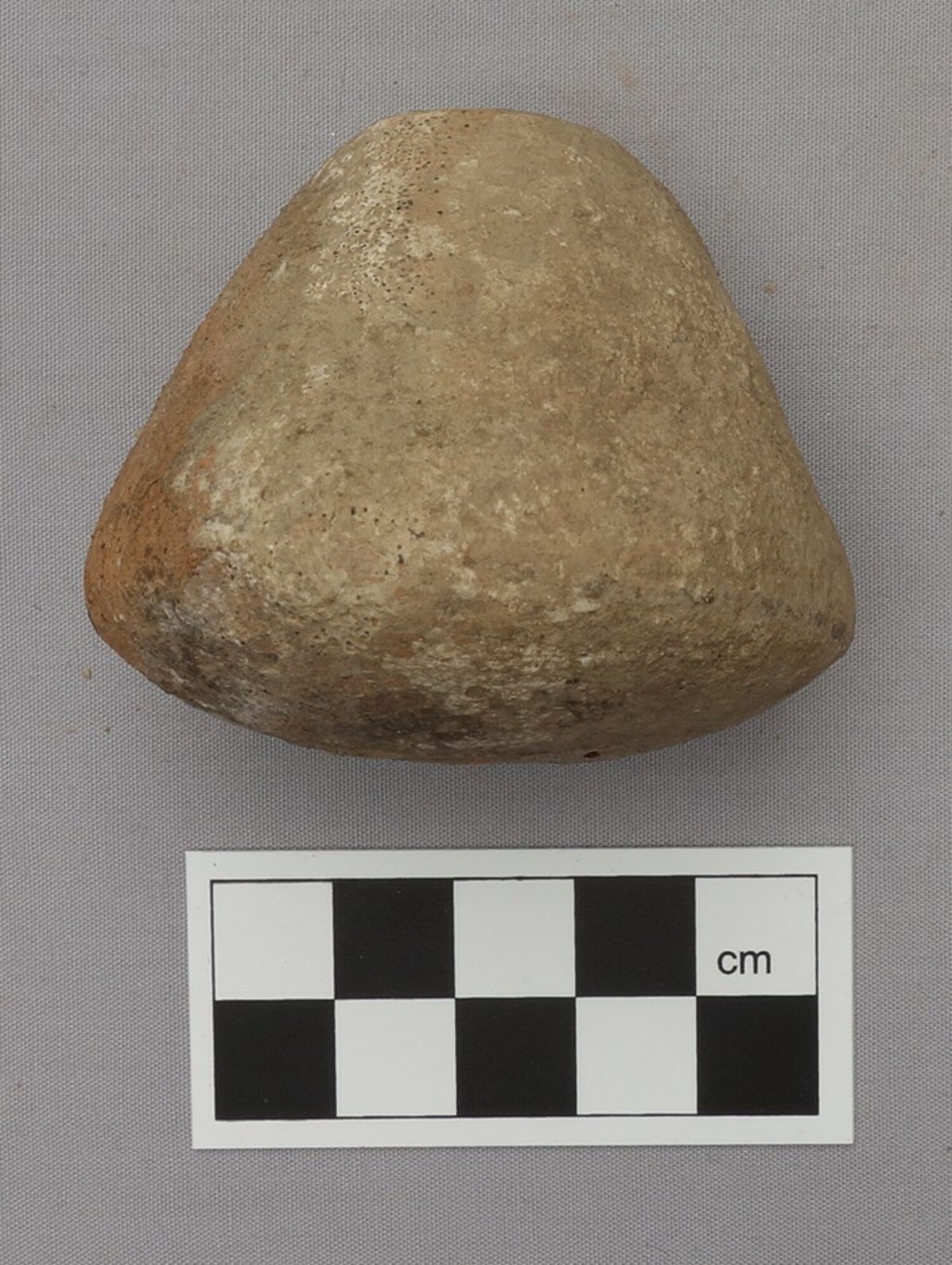 Baked-clay whorl from Early Bronze Age Greece (TRC 2014.0802).