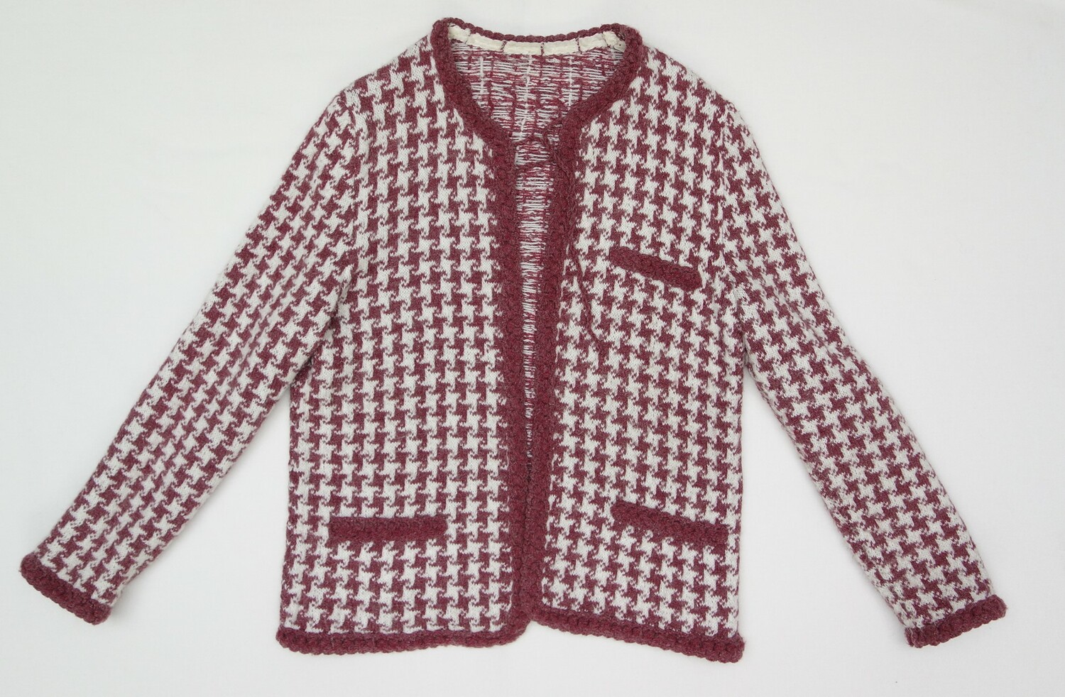 Knitted jacket produced in imitation of Chanel garment, early 1970s, Romania (TRC 2020.0347a).