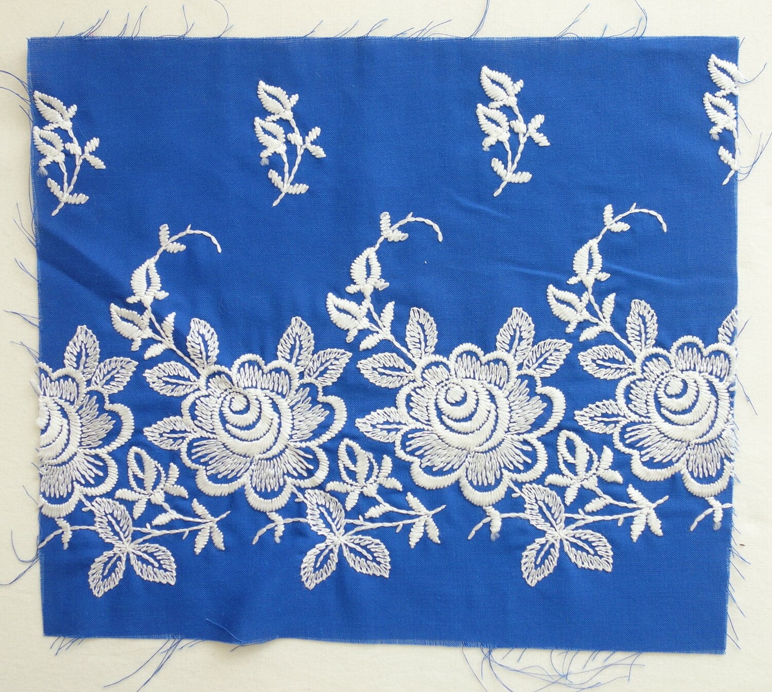 Piece of machine embroidery, European, late 20th century (TRC 2020.1033).