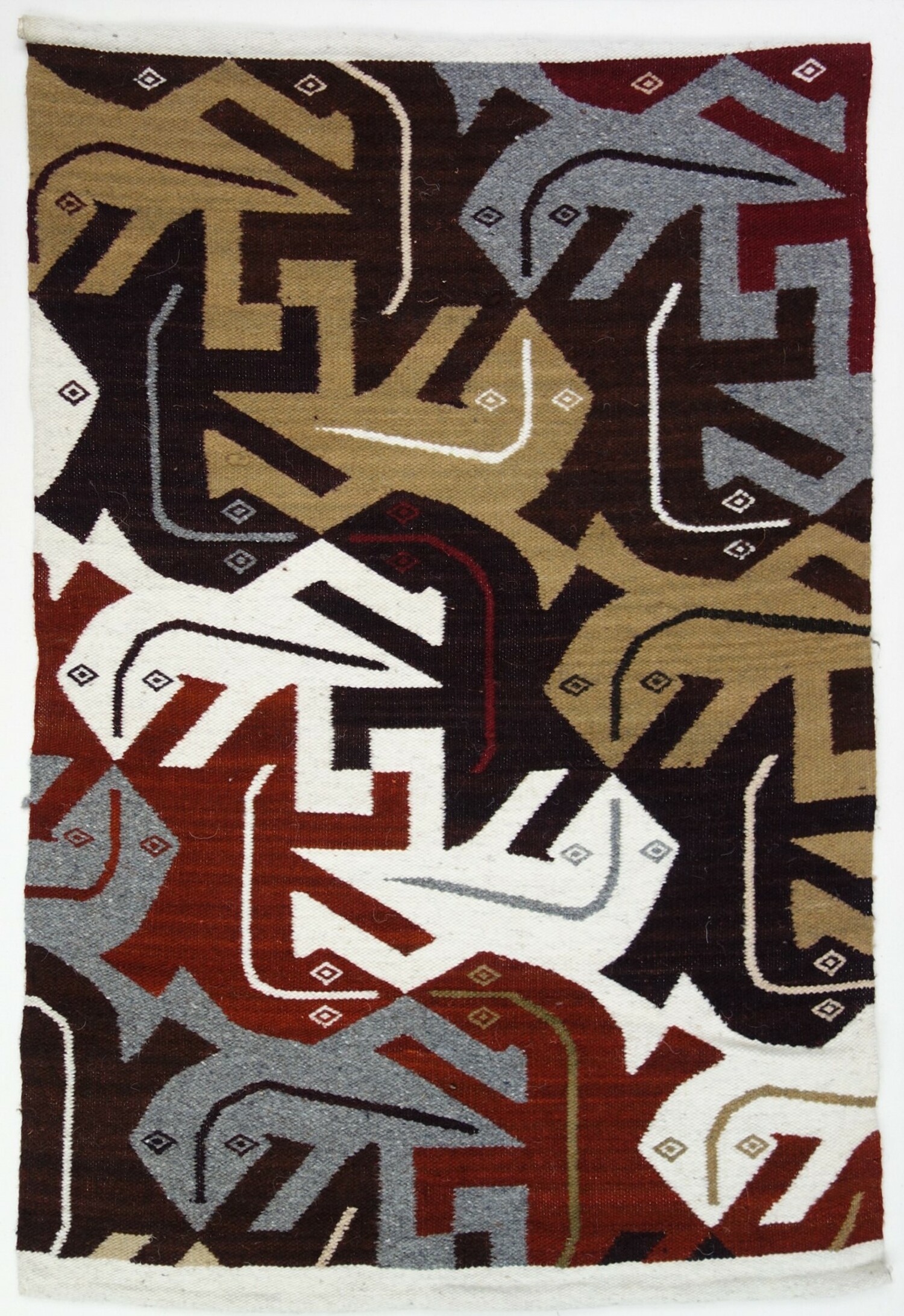 Wall hanging, mid-20th century. The design is based on a print by the Dutch artist, Maurits Cornelis Escher (1898-1972). The print is called "Reptiles" and was printed in 1943 (TRC 2020.3742).