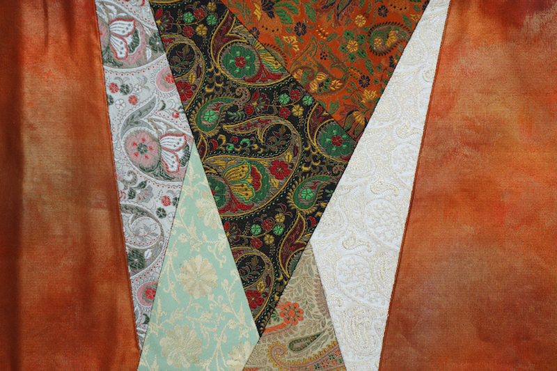 Detail of a Japanese sash (obi) for a woman, late 20th century, with various paisley motifs (TRC 2020.3936).