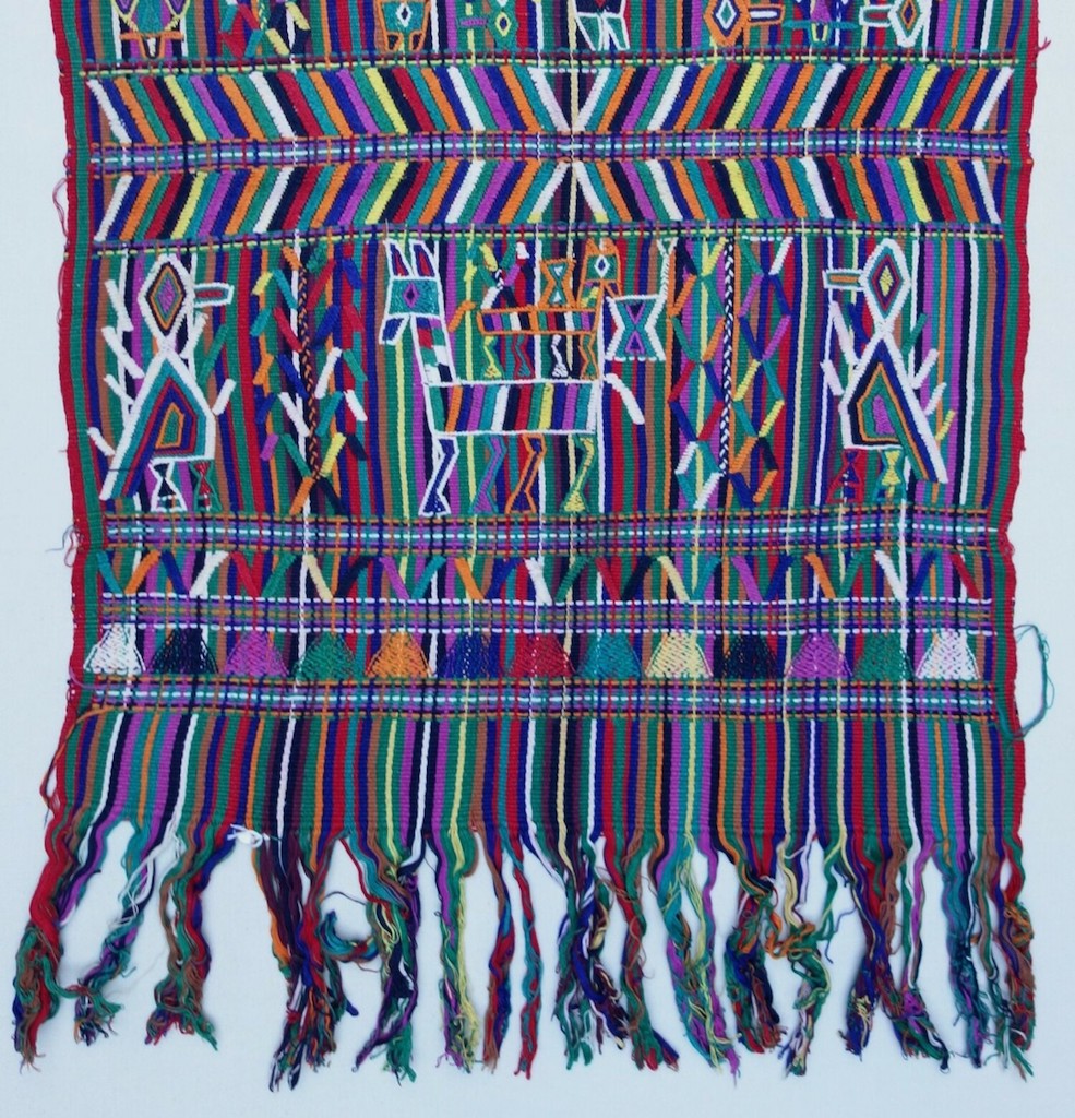 A cloth from the Nebaj region in Guatemala, with a woven and embroidered design of birds, lama's etc., late 20th century (TRC 2020.4575).