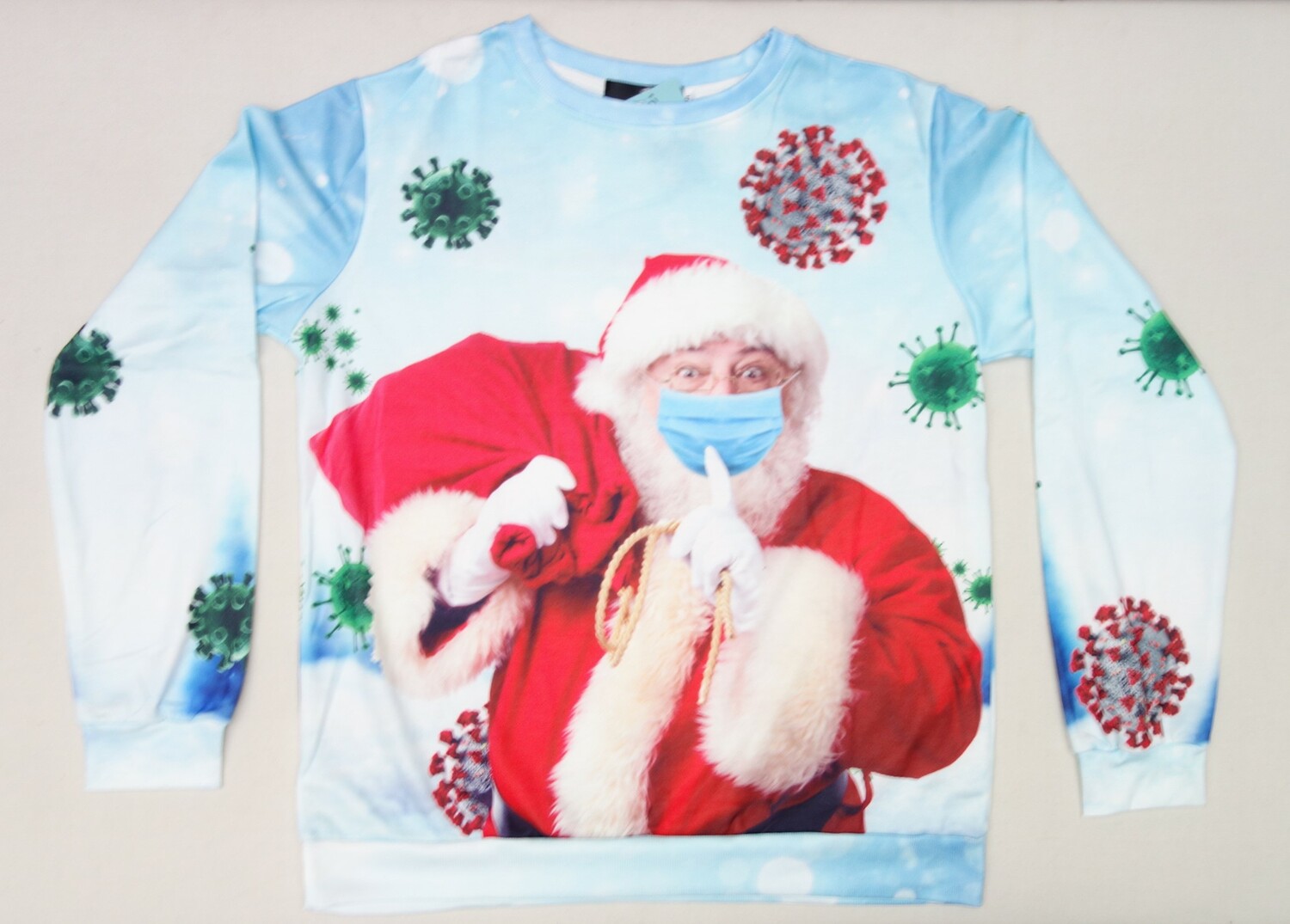 Christmas jumper 2020, sold in the Netherlands, produced in China, with Father Christmas wearing a Covid face mask (TRC 2020.5178).