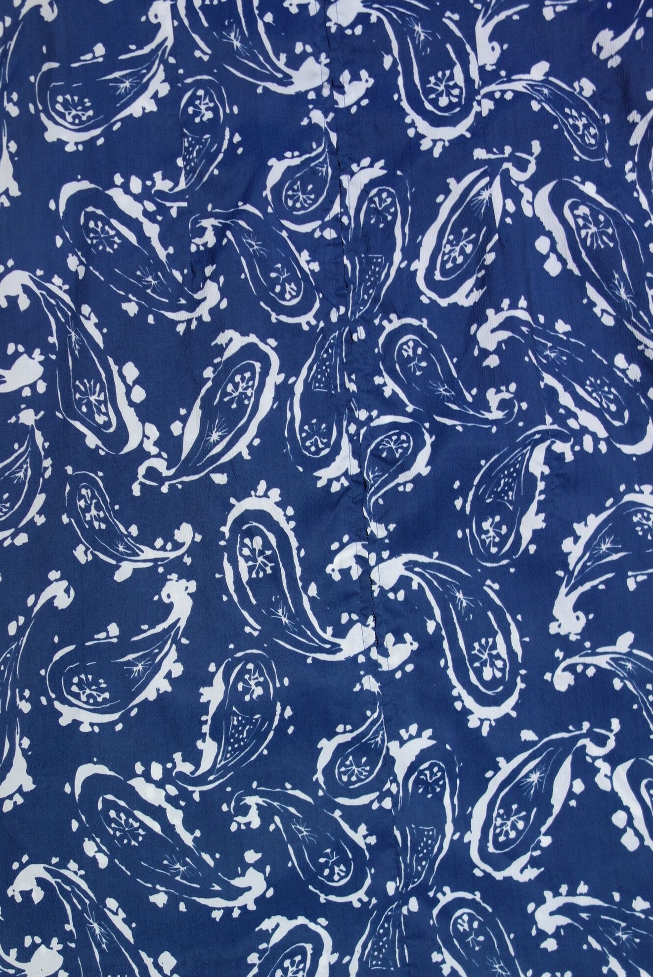 Detail of a dress with paisley motifs that enclose an 'atomic' design. USA, 1960's (TRC 2021.0355).