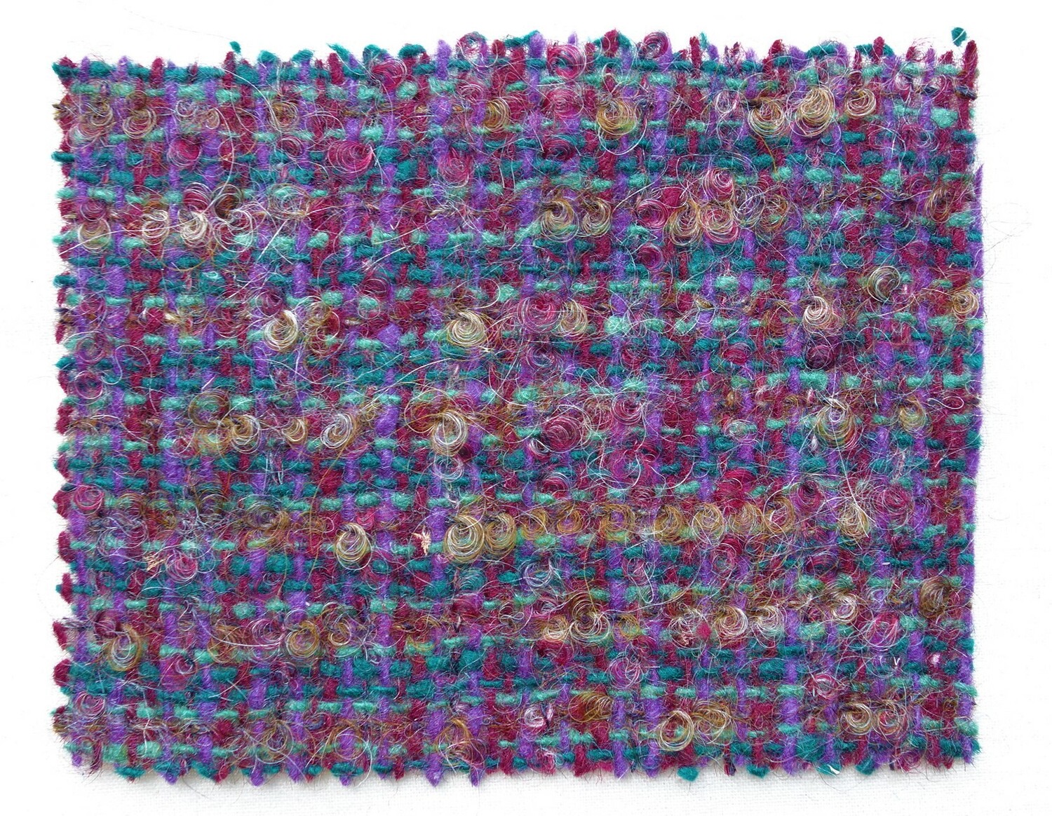 Woven sample with a tweedy check in dark blue, green and dark red bouclé yarns, Europe, 20th century (TRC 2021.1580d).