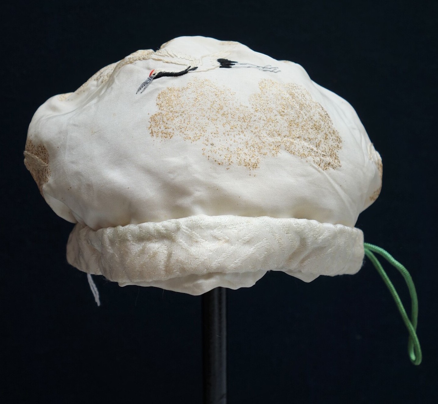 A white cap used for a baby boy, 1920s, Japan (TRC 2021.2136).