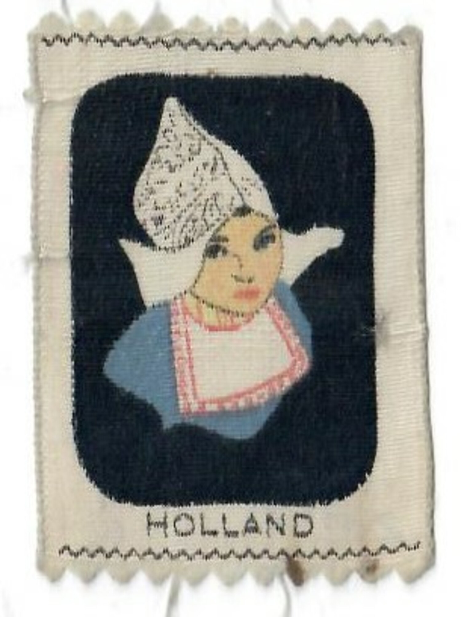 Printed cigarette silk with the image of a Volendam girl, 1920a-1930a (TRC 2021.2471i).