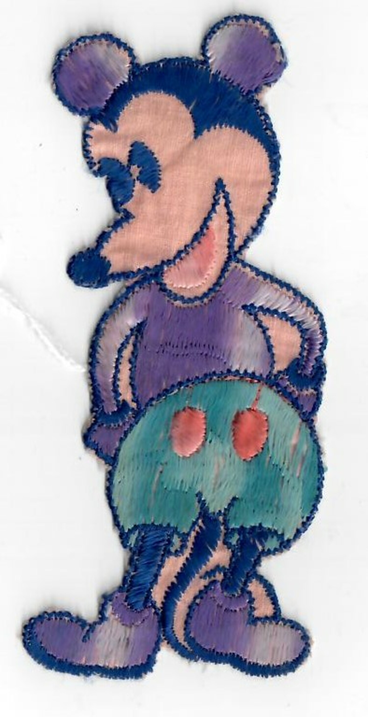Machine embroidered cigarette silk showing an early version of Mickey Mouse, ca. 1930 (TRC 2021.2474d).