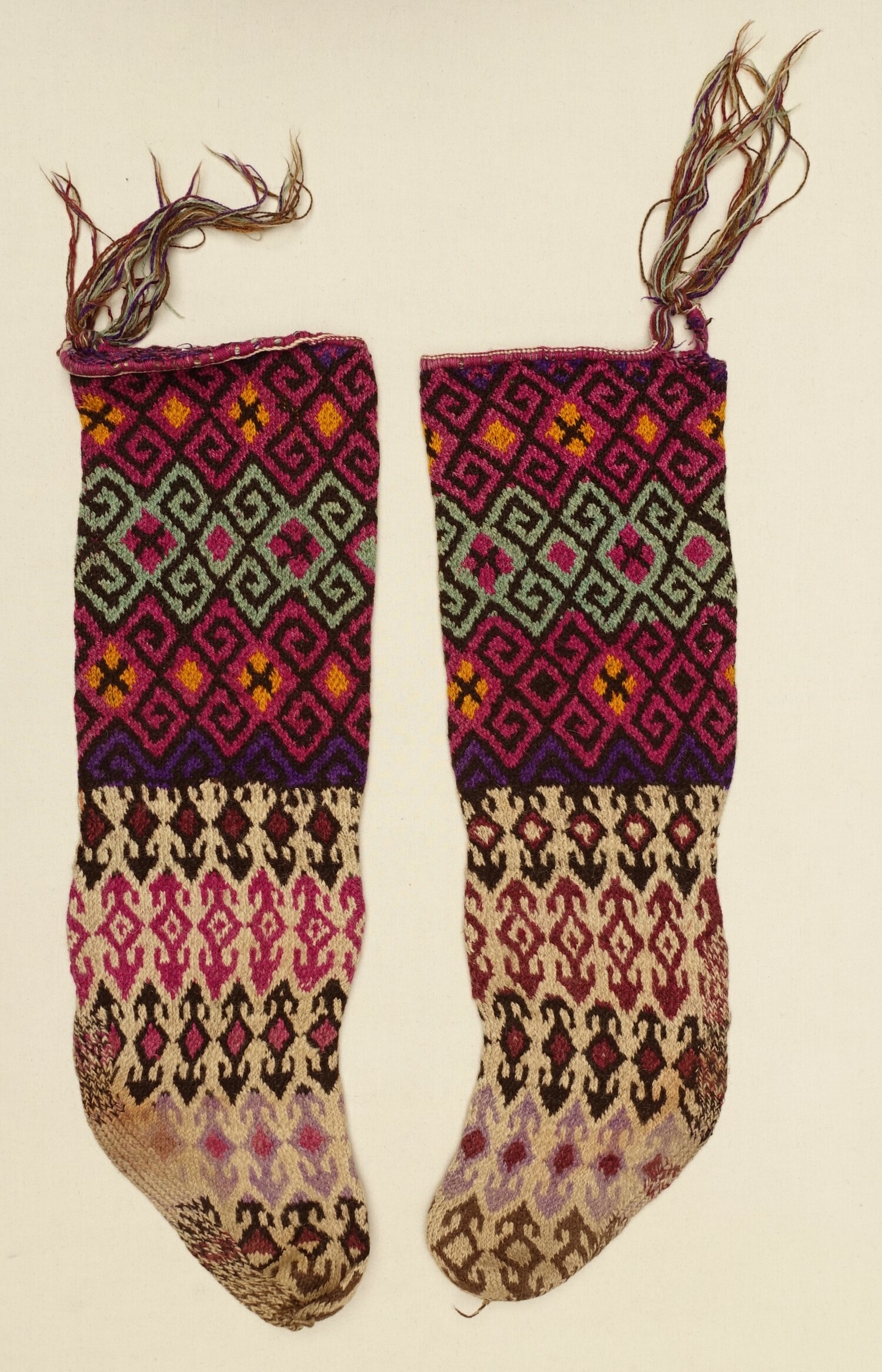 Pair of hand knitted, woollen socks, Afghanistan, 1960s (TRC 2022.1931a-b).