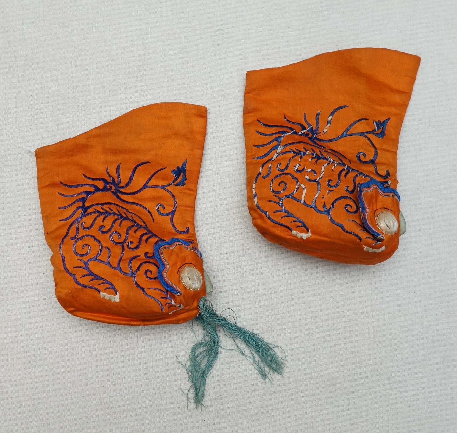 Pair of embroidered tiger boots for a boy, China, 20th century (TRC 2023.1248a-b).