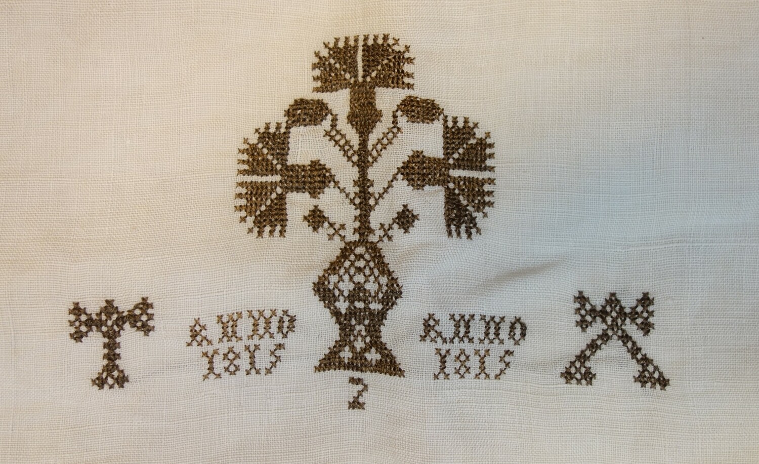 Detail of an embroidered  linen bag from the north of the Netherlands, dated 1815 (TRC 2023.1972).