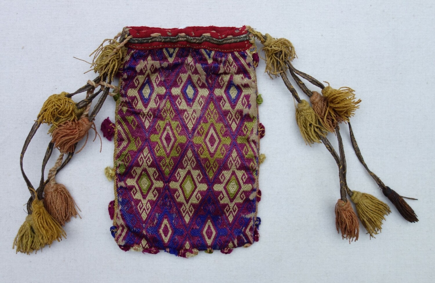 Embroidered bag, Hazara, Afghanistan, 1960s-1970s (TRC 2024.0239).