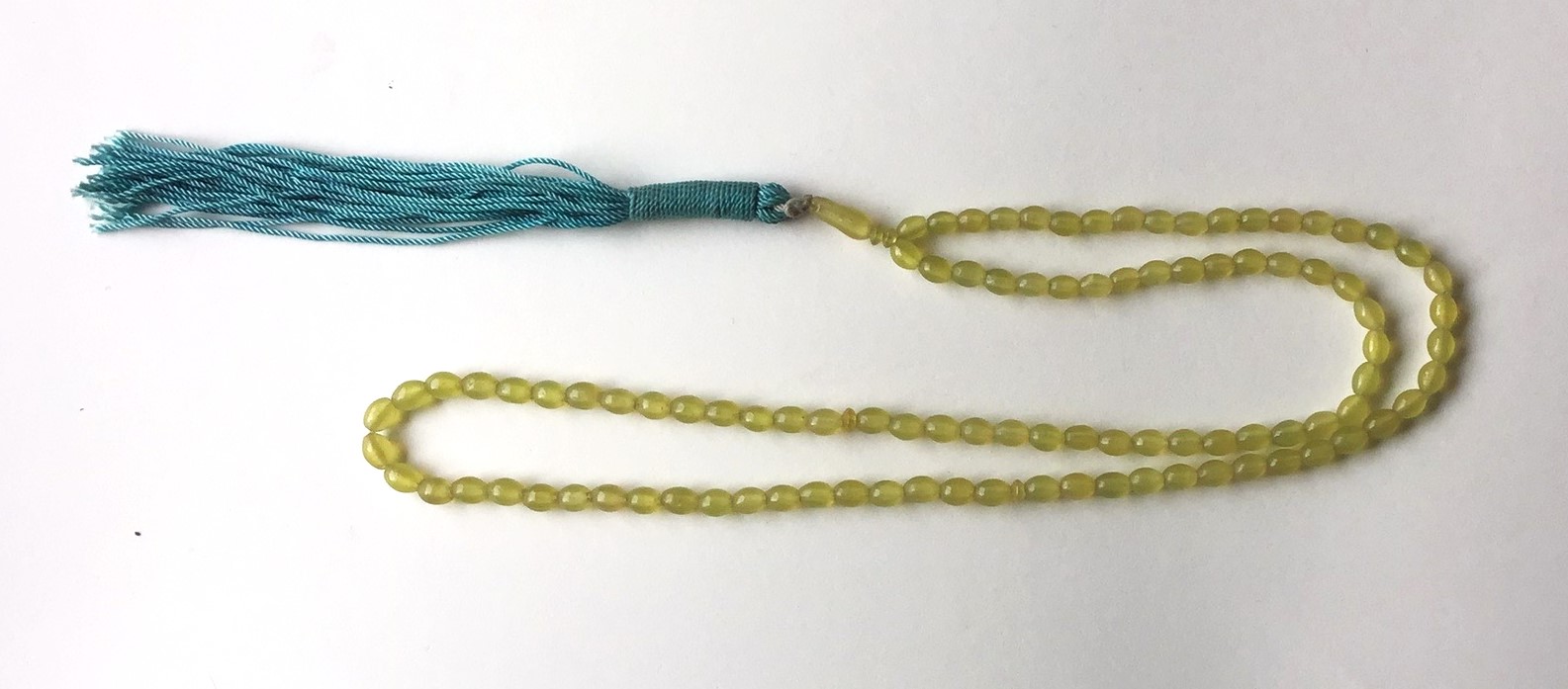 Set of prayer beads made from Shah Maqsud chrysolite stone, from southern Afghanistan, pre-1965 (TRC 2024.1940).