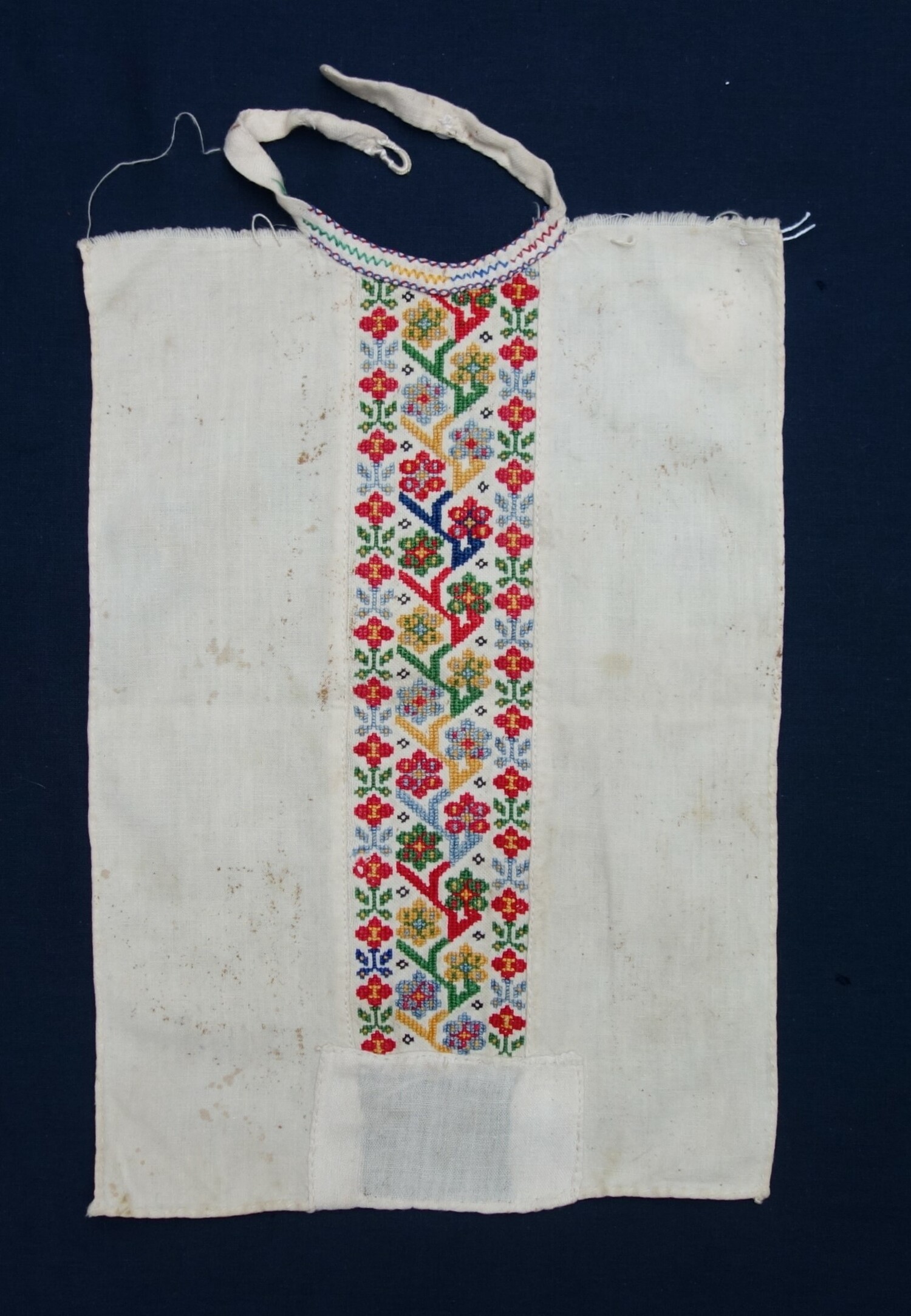 Fig. 1. Cotton woman's plastron, hand woven and hand embroidered. Vergina, Greece, 20th century (TRC 2025.0221).