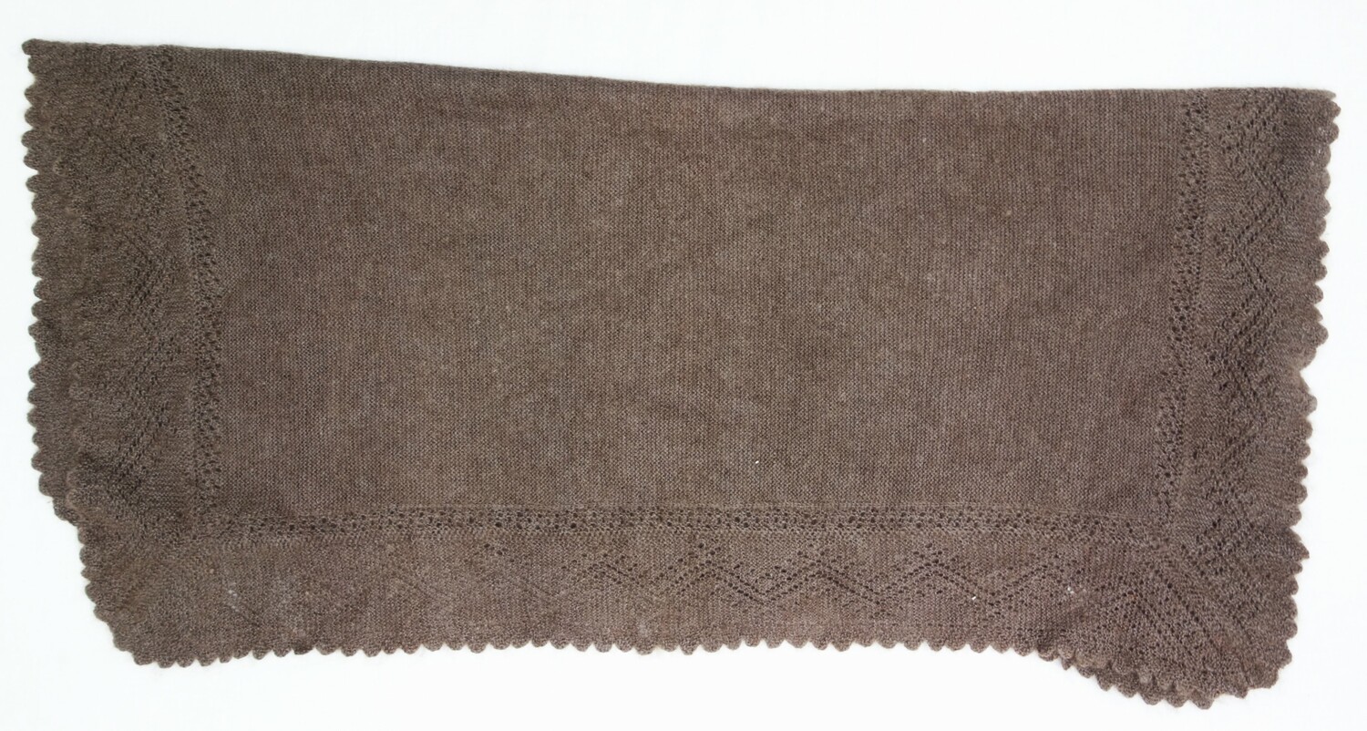 Orenburg hand knitted 'warm' shawl in dark brown. Russia, 20th century (TRC 2025.0751).