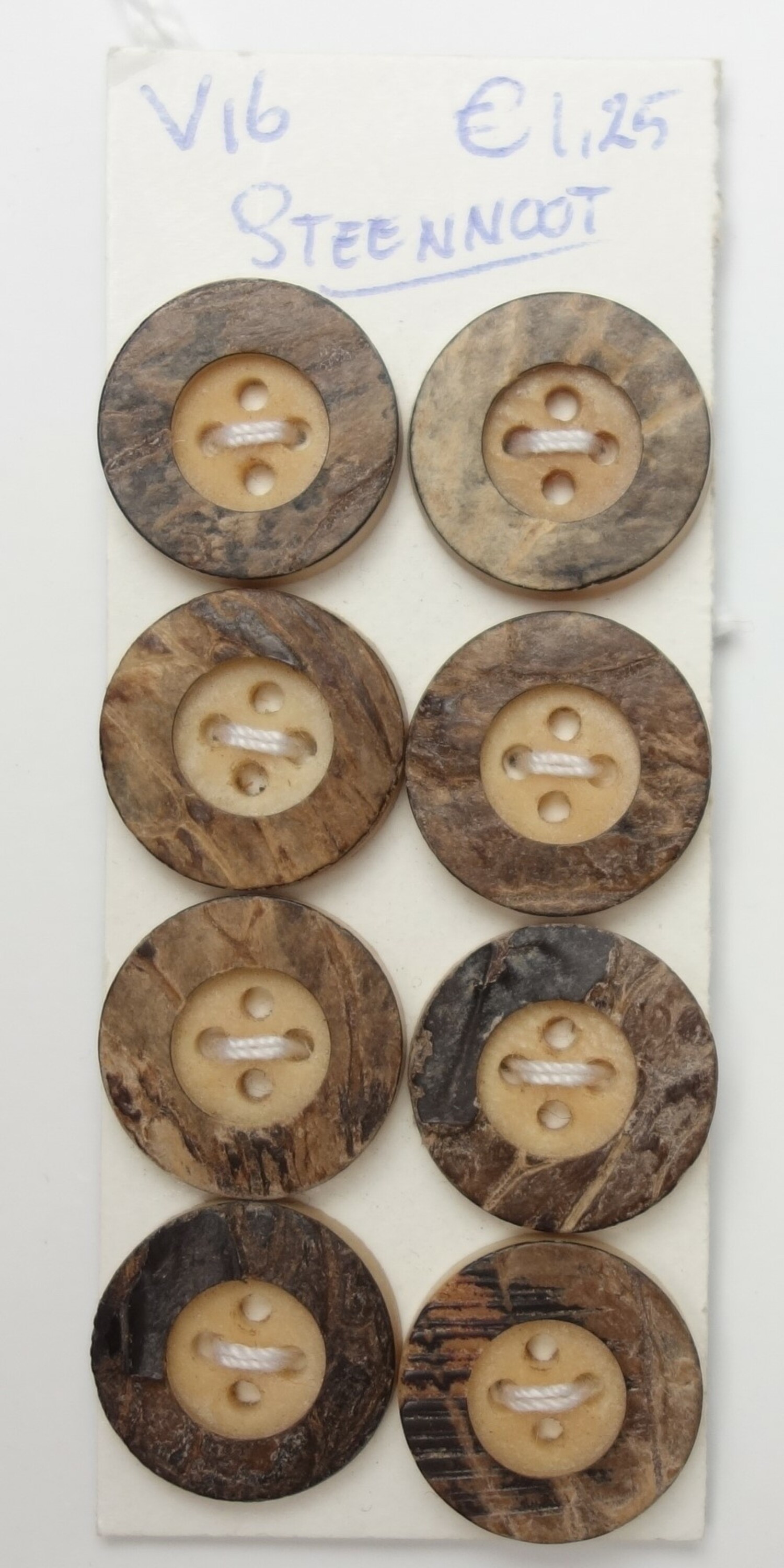 Sheet of buttons made from corozon nuts, Europe, 20th century (TRC 2025.0851).