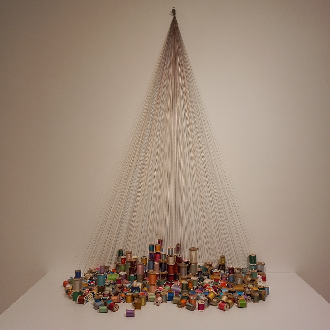 'Colorial', with 300 bobbins with threads of different colours. 2014. Artist: Natalia Villanueva Linares.