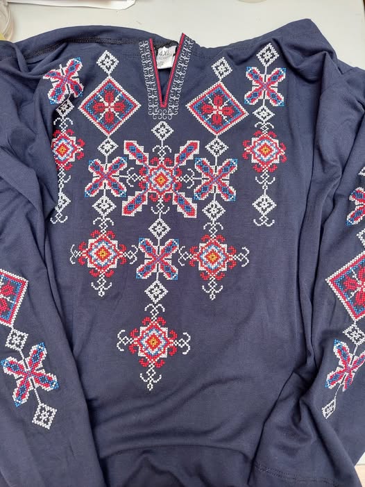 Fig. 1. Modern vyshyvanka recently donated to the TRC. Kyiv, Ukraine, polyester, machine embroidered (TRC 2025.0149).